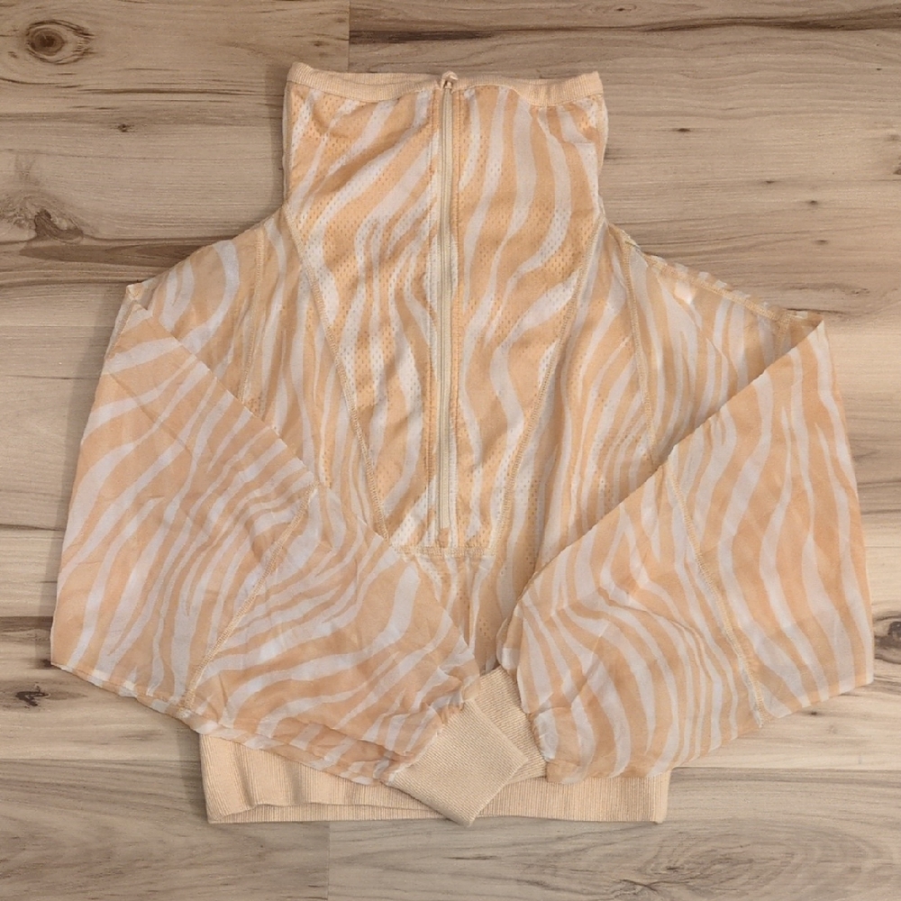 Free People Movement tan zebra print dolman sleeve pullover windbreaker Size S